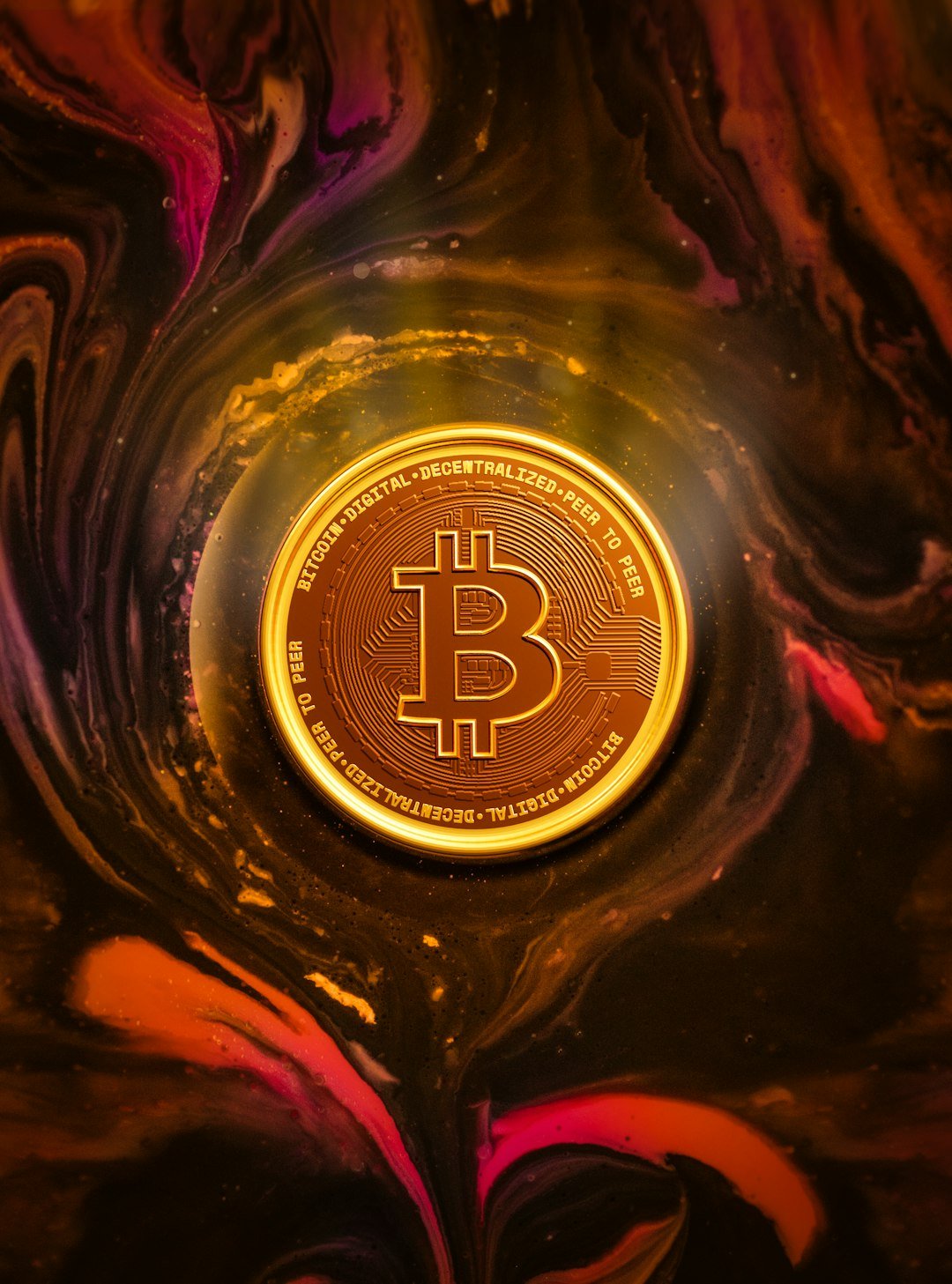 a-bitcoin-sitting-on-top-of-a-glass-bowl-x-cacvhcns